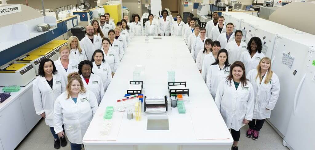 staff photo inside acs cannabis laboratory
